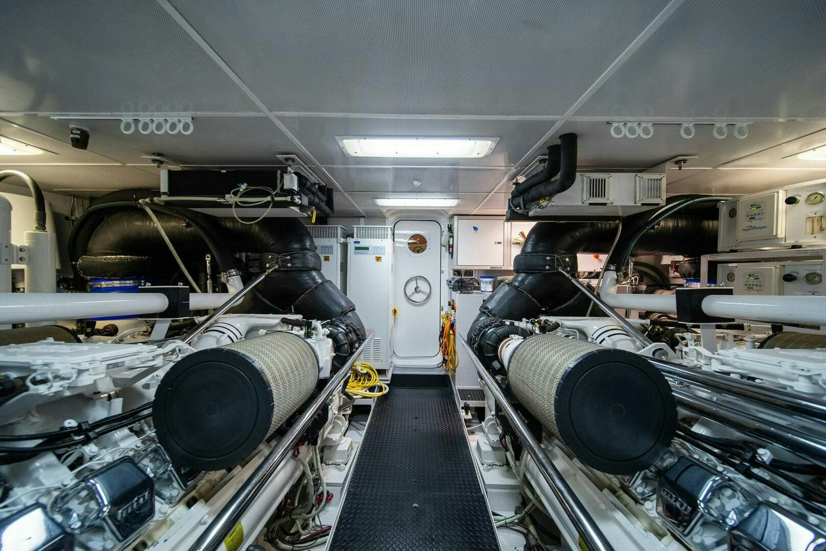 a large machine in a room aboard JEANNIETINI NAME RESERVED Yacht for Sale