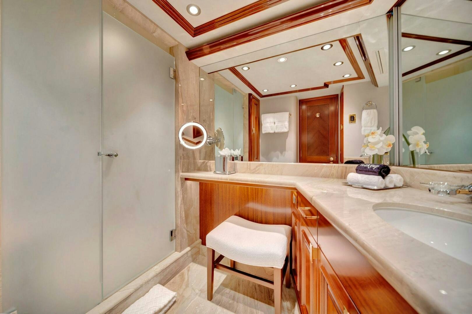 a bathroom with a large mirror aboard JEANNIETINI NAME RESERVED Yacht for Sale