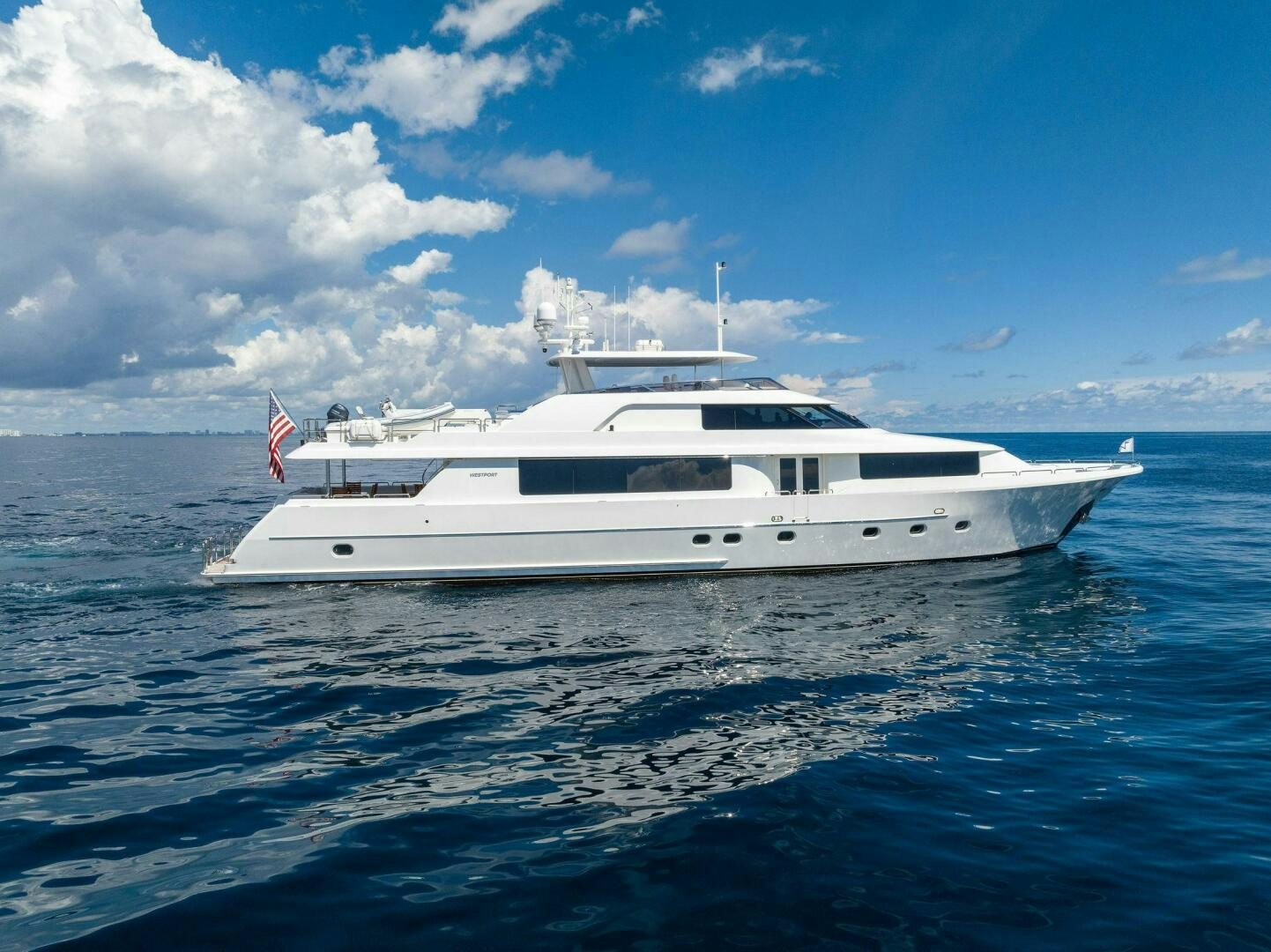 a white yacht in the water aboard JEANNIETINI NAME RESERVED Yacht for Sale