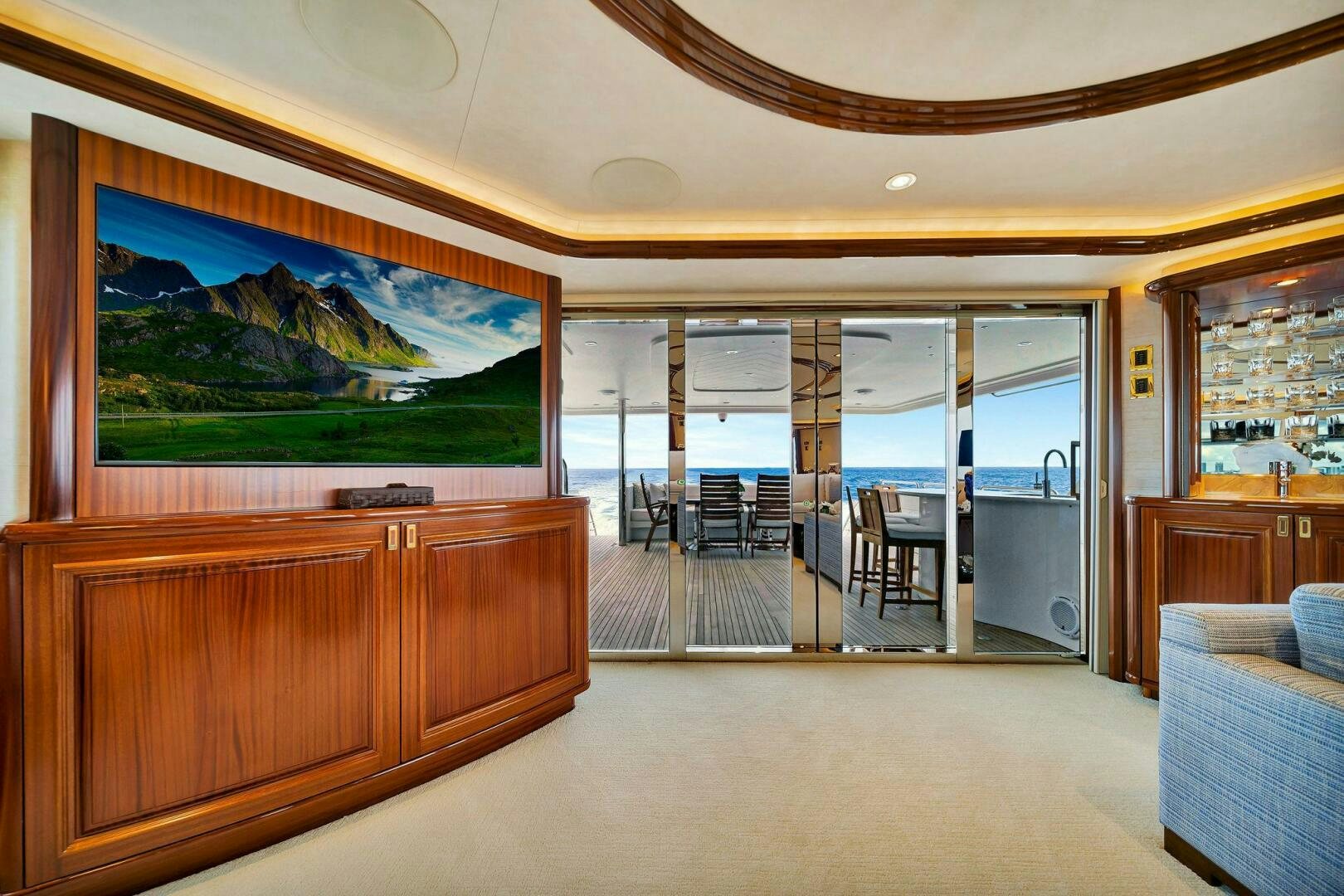 a large room with a large glass door and a large window aboard JEANNIETINI NAME RESERVED Yacht for Sale