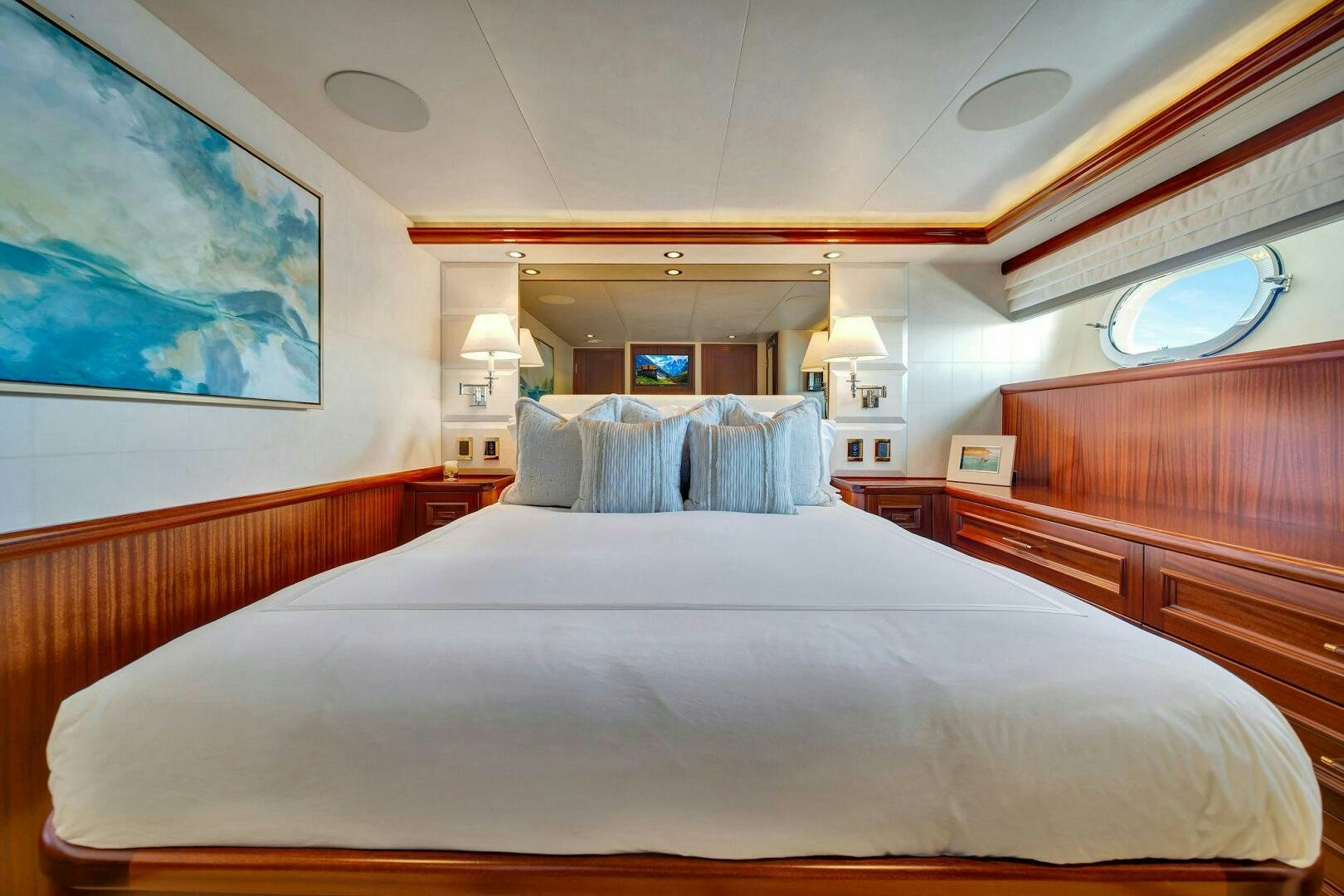 a bed with a white sheet and a white bed spread aboard JEANNIETINI NAME RESERVED Yacht for Sale