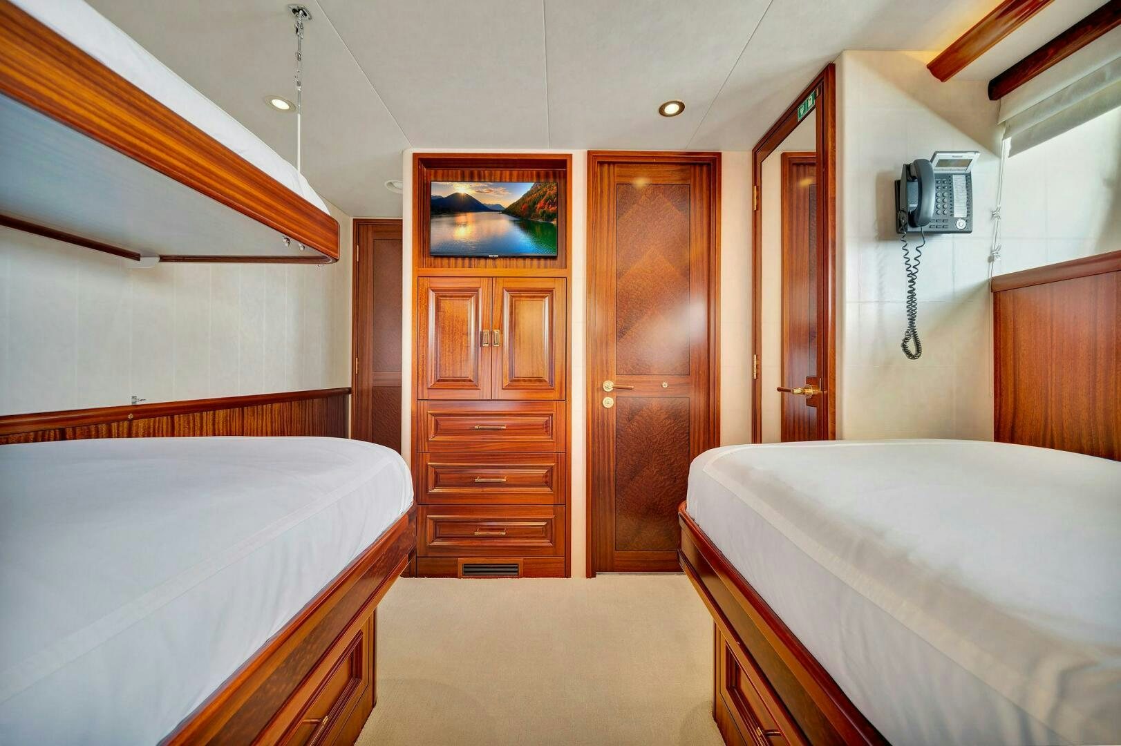 a room with a couple of beds aboard JEANNIETINI NAME RESERVED Yacht for Sale