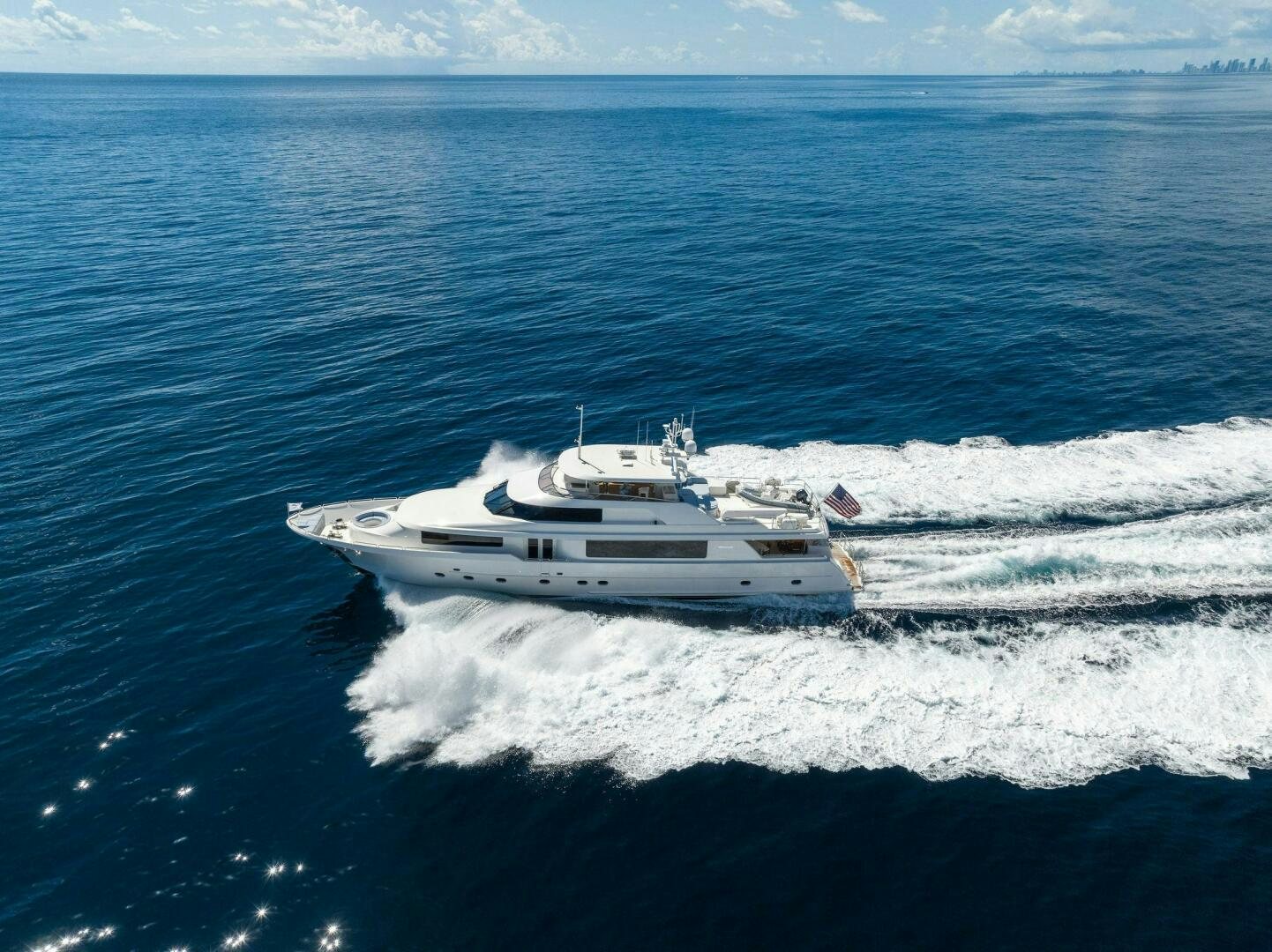 a white boat in the water aboard JEANNIETINI NAME RESERVED Yacht for Sale