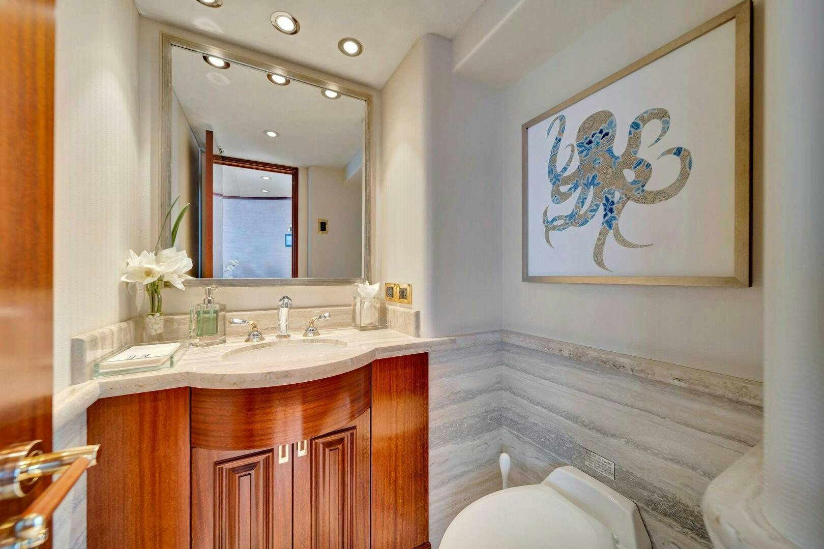 a bathroom with a large mirror aboard JEANNIETINI NAME RESERVED Yacht for Sale