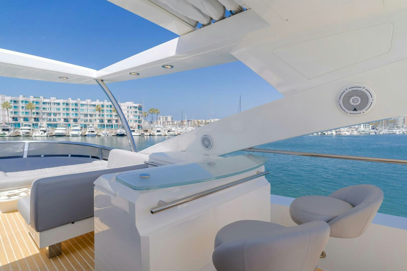 a boat with a view of the city below aboard INDECENT PROPOSAL IV Yacht for Sale