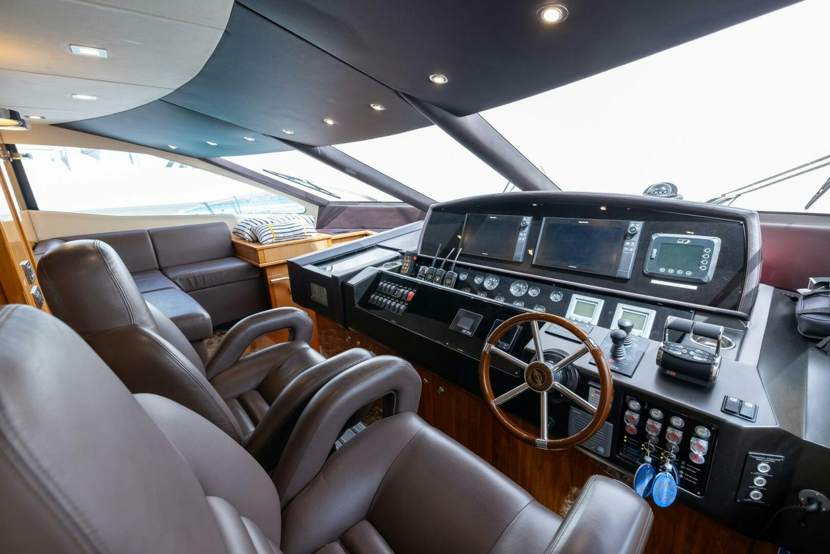 inside of a car aboard INDECENT PROPOSAL IV Yacht for Sale