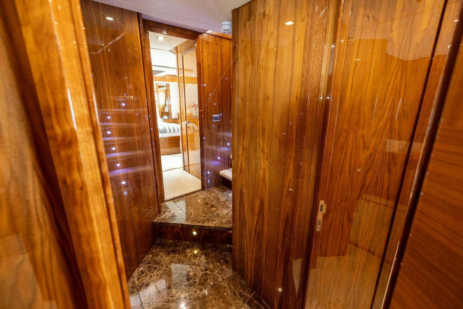 a room with wood walls aboard INDECENT PROPOSAL IV Yacht for Sale