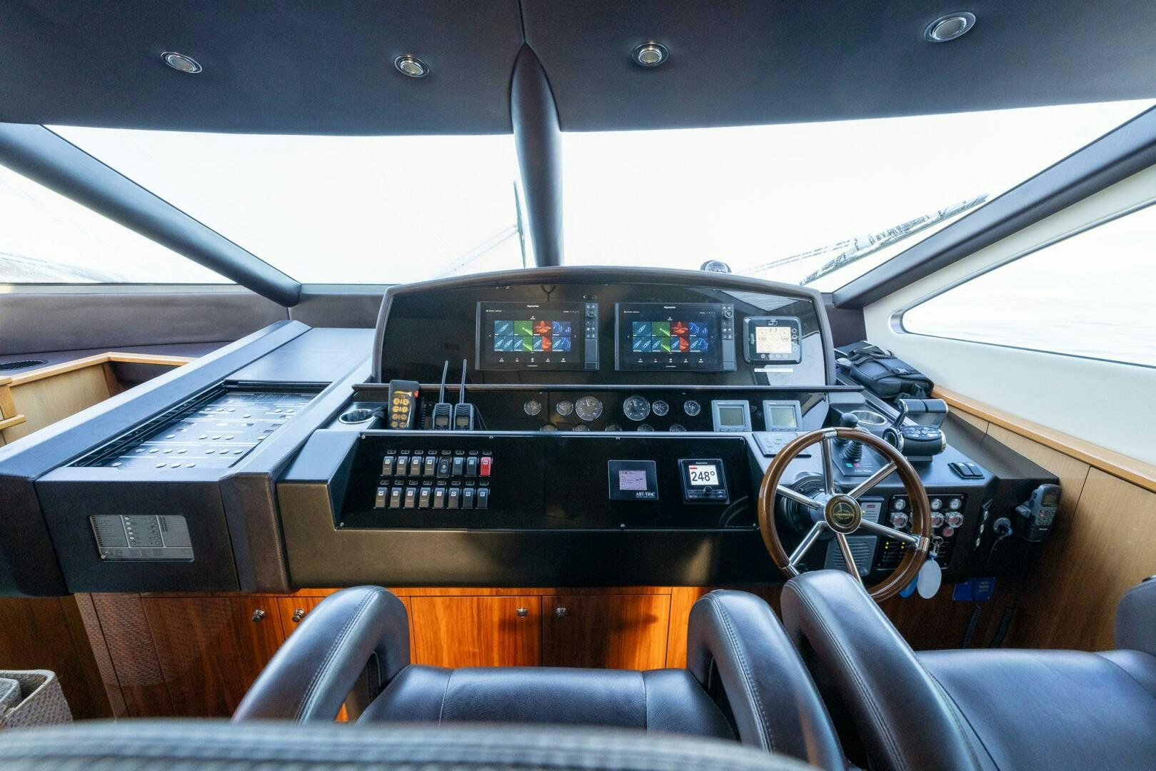 the inside of a car aboard INDECENT PROPOSAL IV Yacht for Sale
