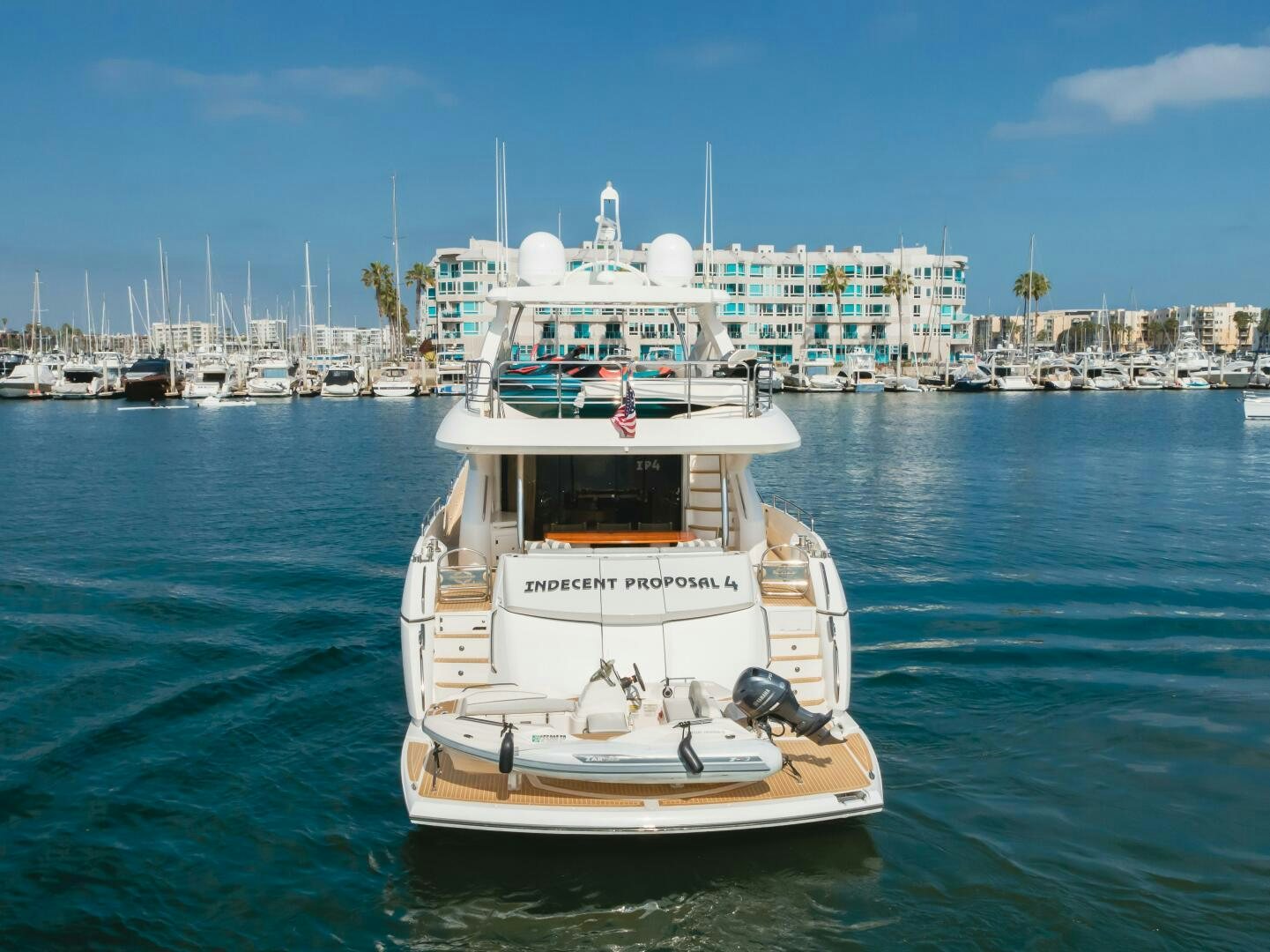 a boat in the water aboard INDECENT PROPOSAL IV Yacht for Sale