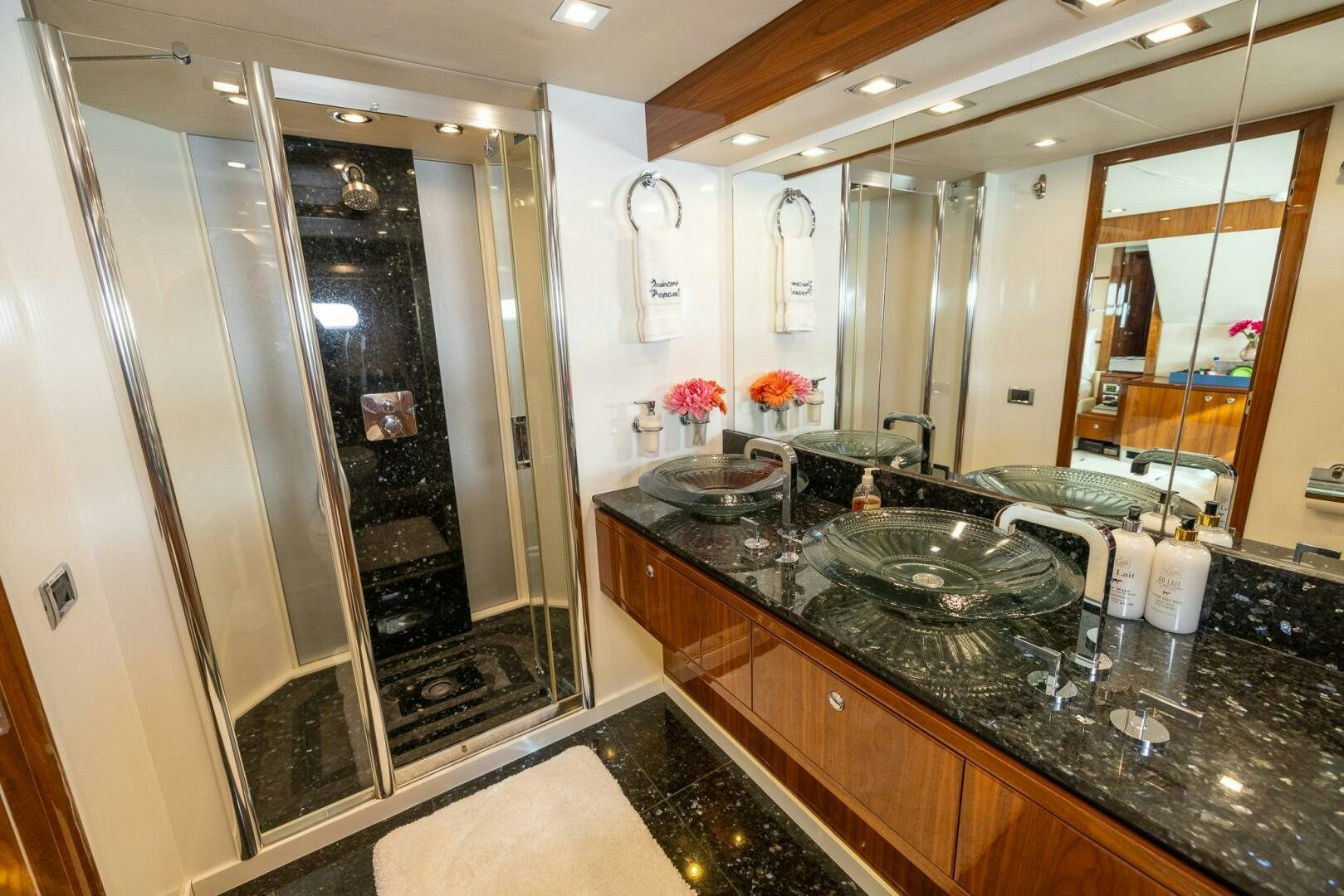 a bathroom with a marble counter top aboard INDECENT PROPOSAL IV Yacht for Sale