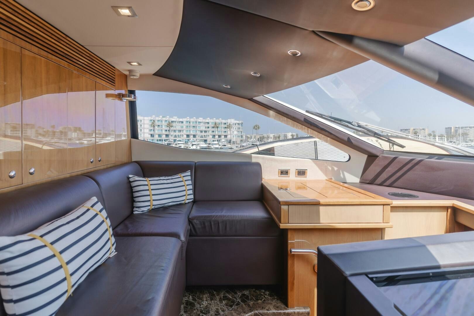 inside of a car aboard INDECENT PROPOSAL IV Yacht for Sale