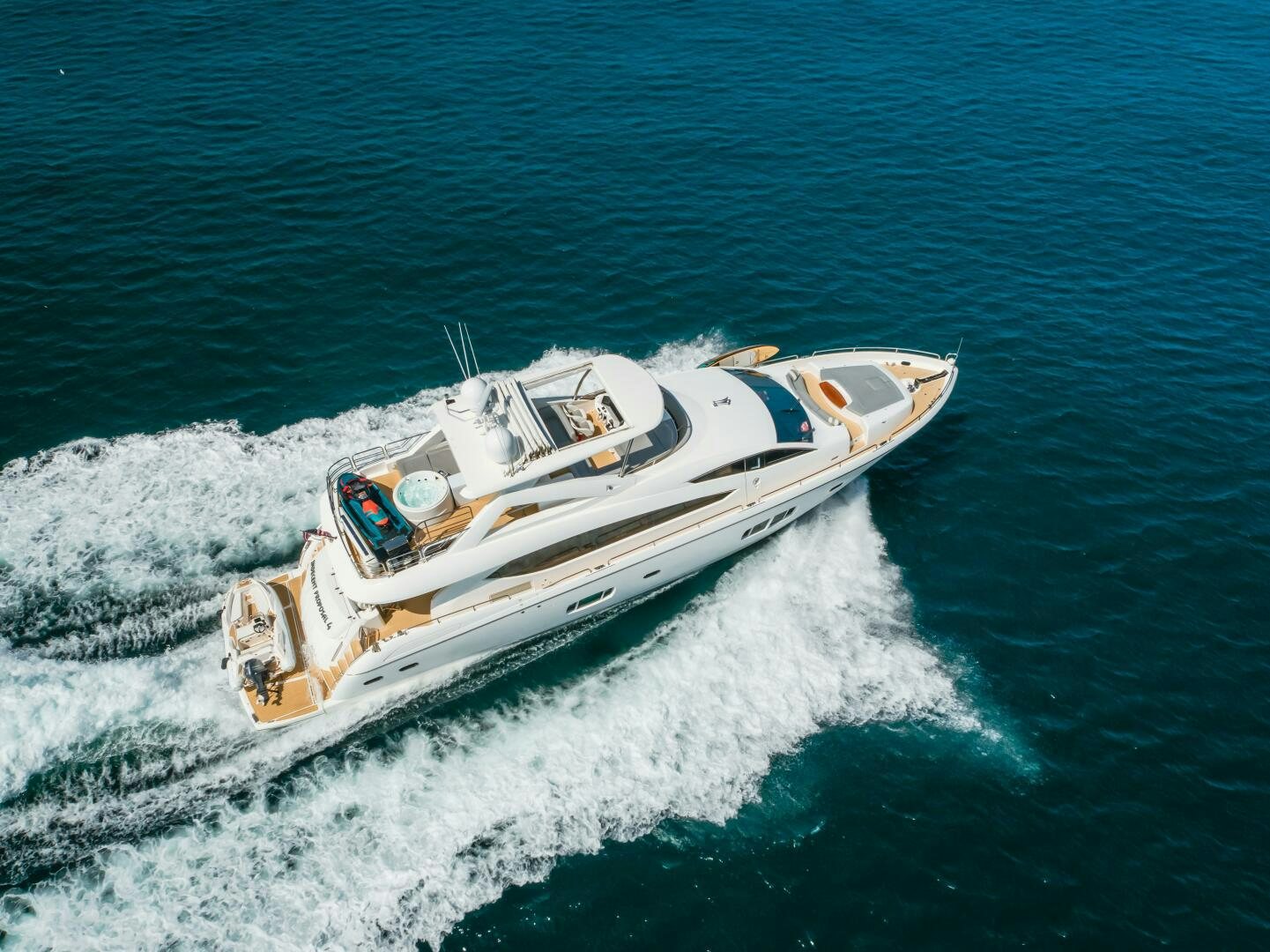 a boat on the water aboard INDECENT PROPOSAL IV Yacht for Sale