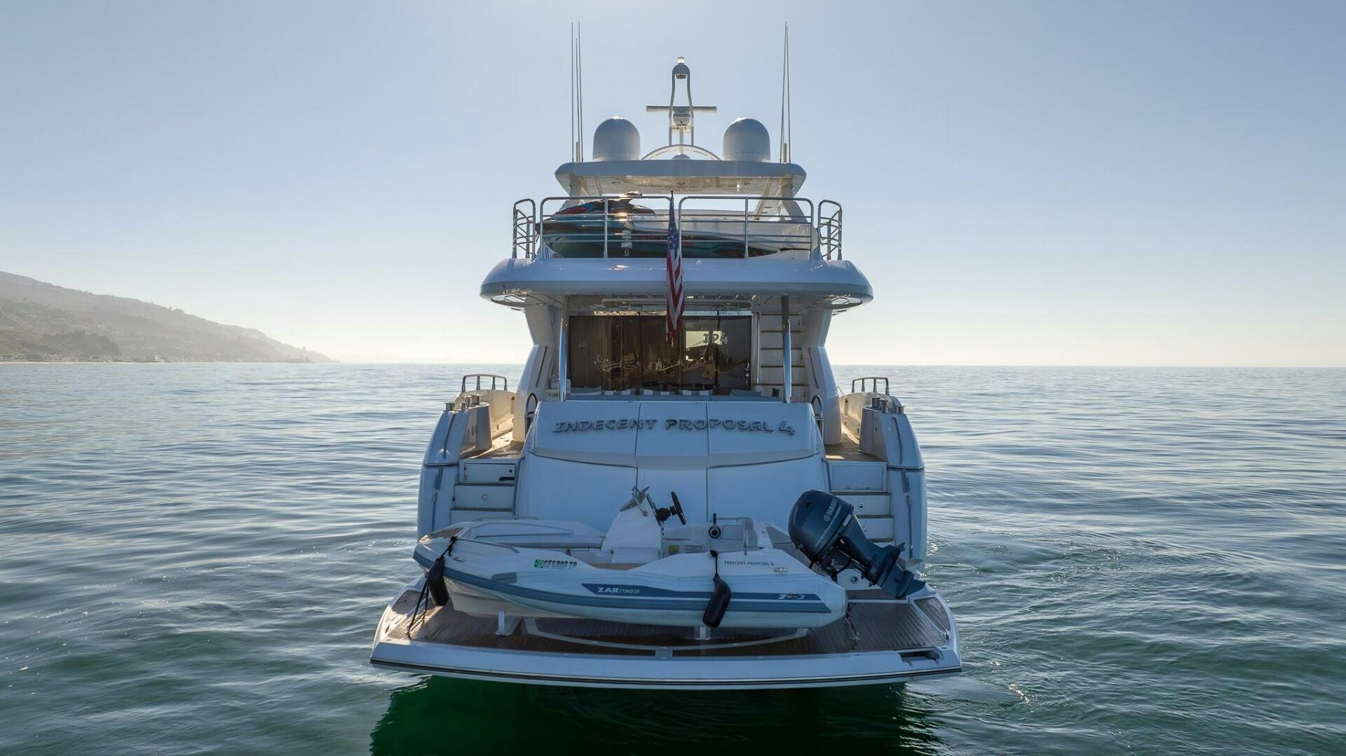 a boat in the water aboard INDECENT PROPOSAL IV Yacht for Sale