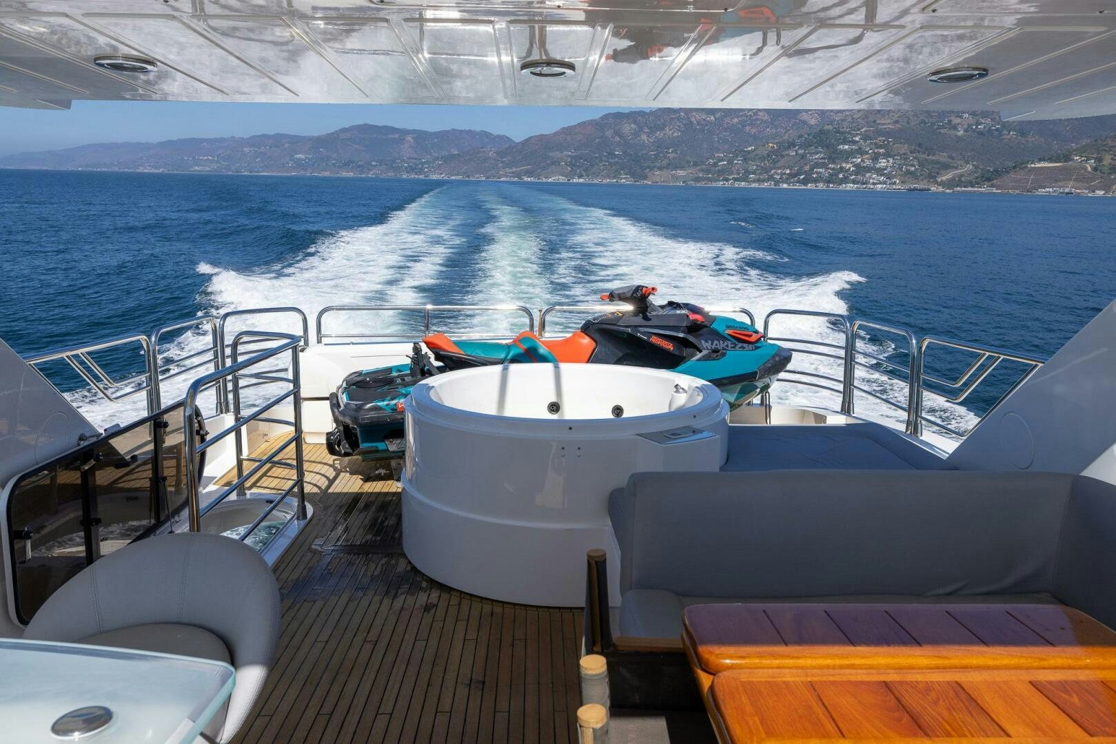 a boat on a deck aboard INDECENT PROPOSAL IV Yacht for Sale