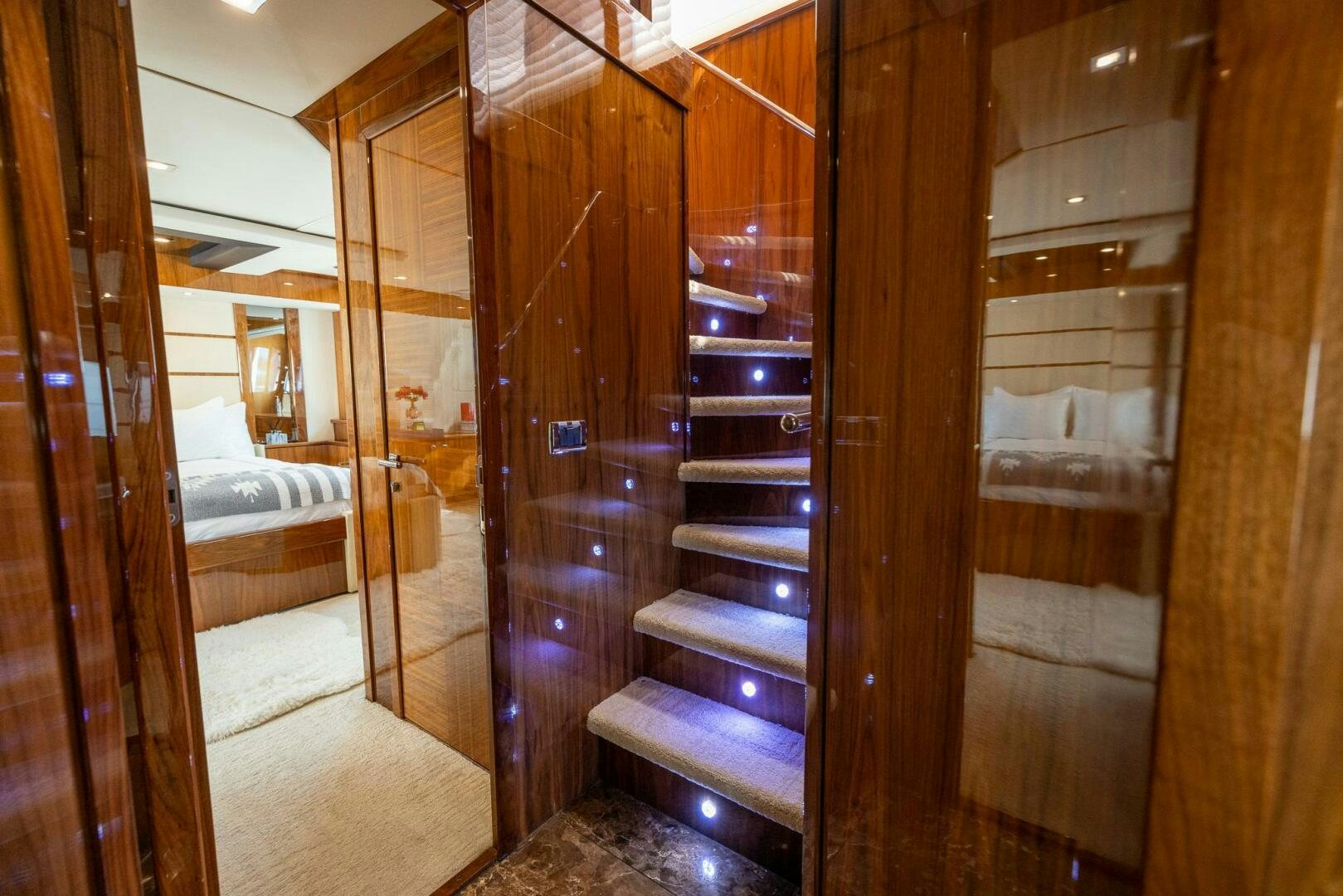 a room with a wood door aboard INDECENT PROPOSAL IV Yacht for Sale