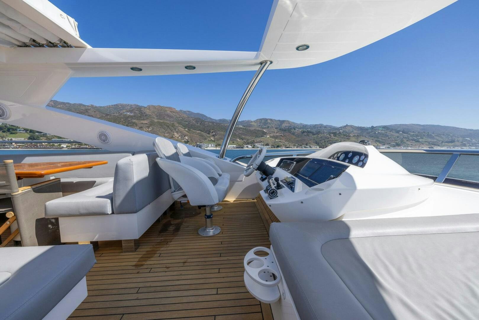 a plane on a deck aboard INDECENT PROPOSAL IV Yacht for Sale