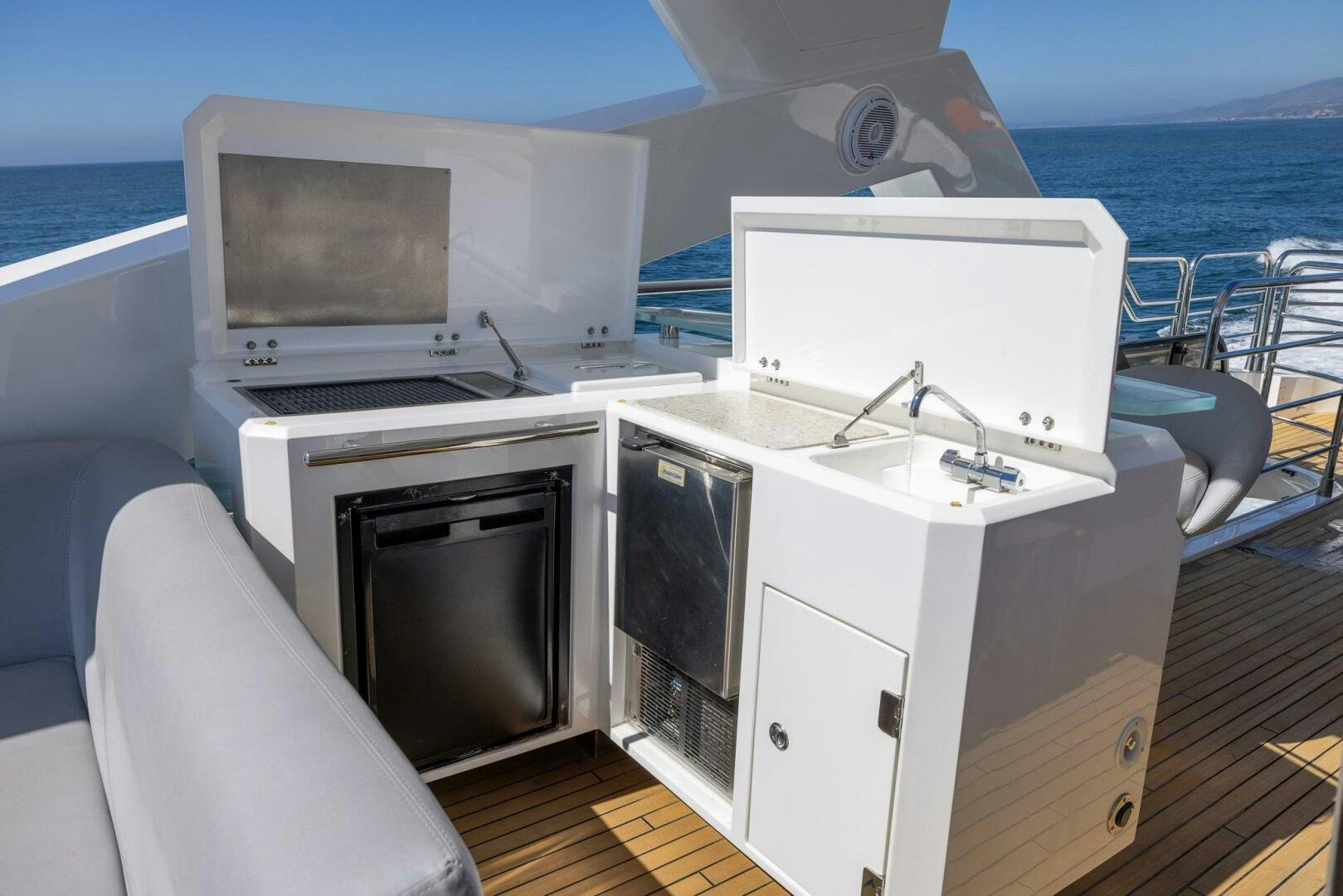 a boat with a tv and a couple of computers on it aboard INDECENT PROPOSAL IV Yacht for Sale