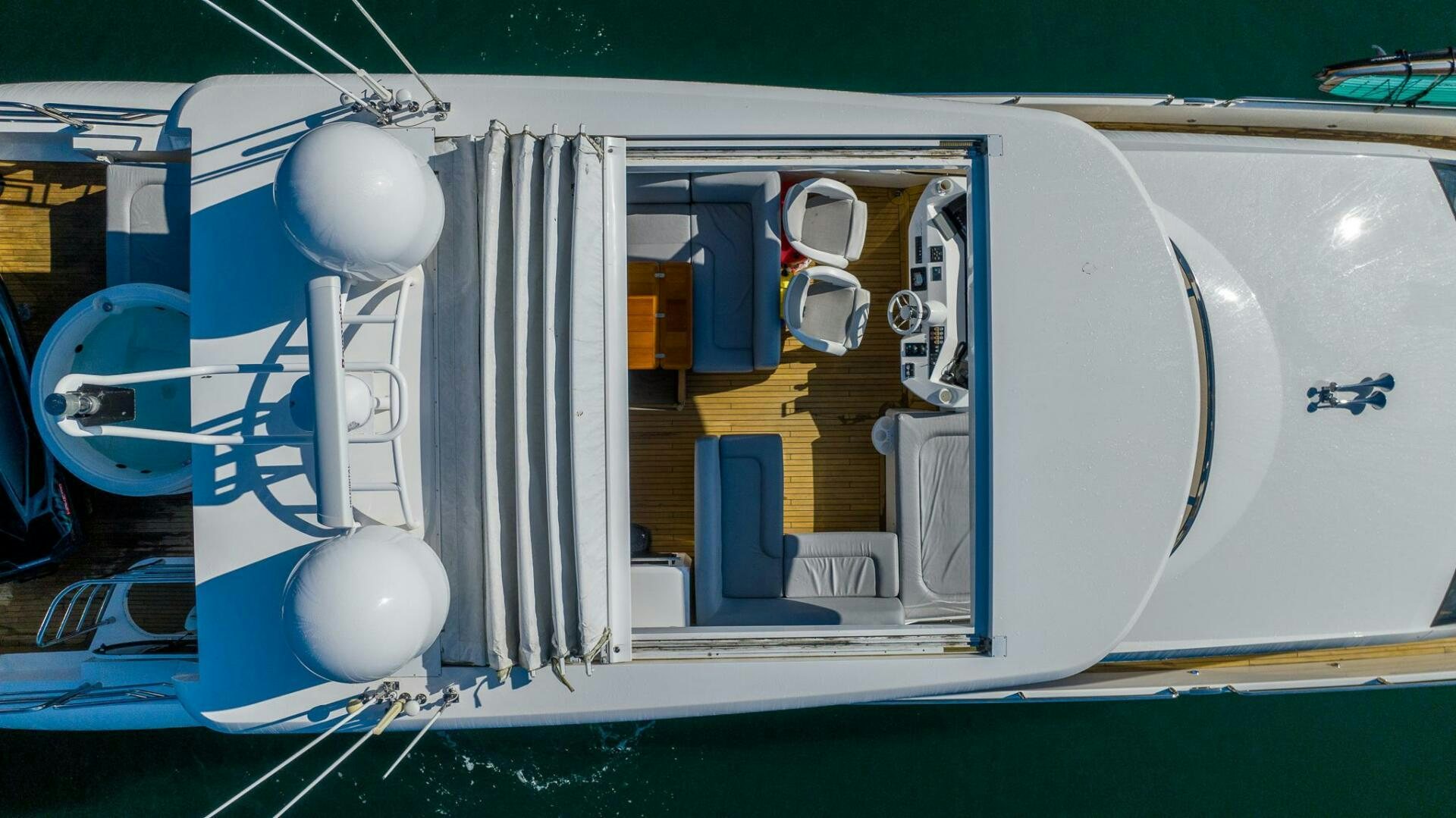 a boat with a blue door aboard INDECENT PROPOSAL IV Yacht for Sale