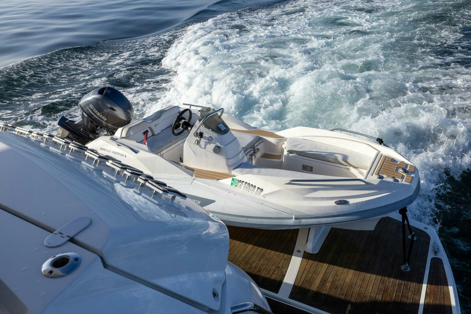 a boat on the water aboard INDECENT PROPOSAL IV Yacht for Sale