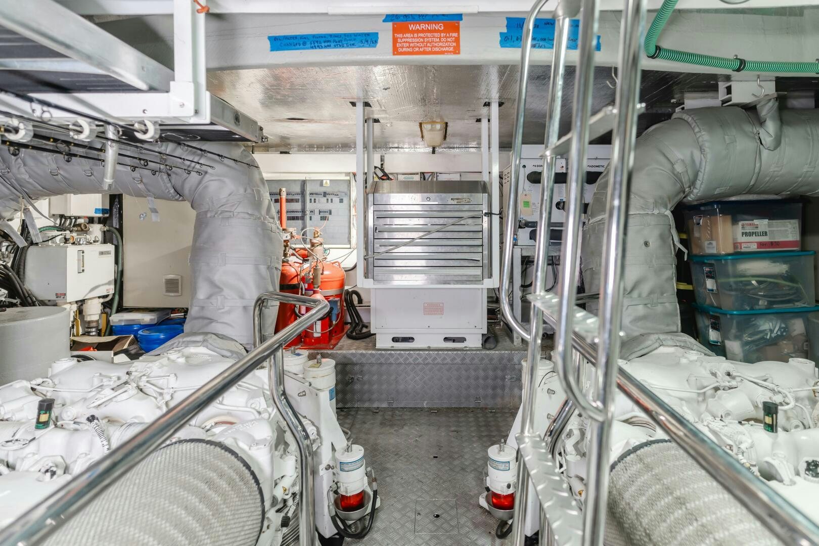 a room with machinery aboard INDECENT PROPOSAL IV Yacht for Sale