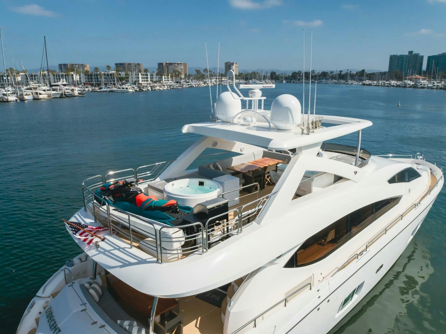 a boat with a lot of boats on it aboard INDECENT PROPOSAL IV Yacht for Sale