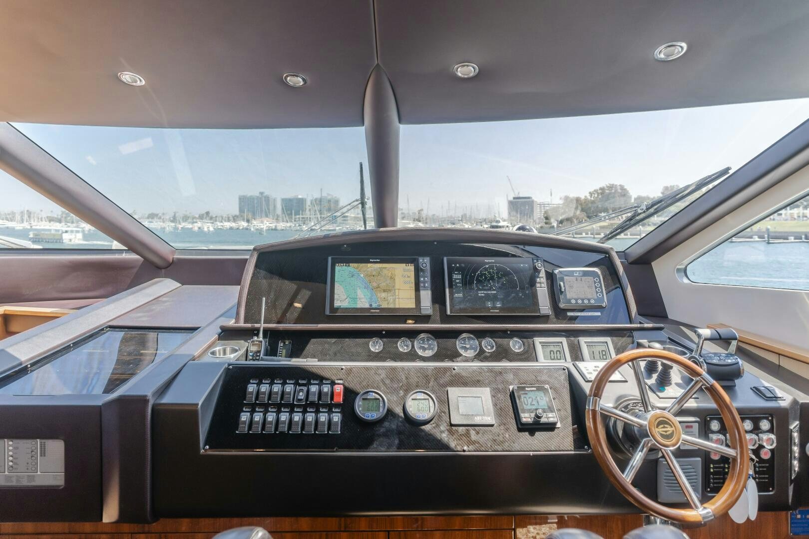 the inside of a car aboard INDECENT PROPOSAL IV Yacht for Sale