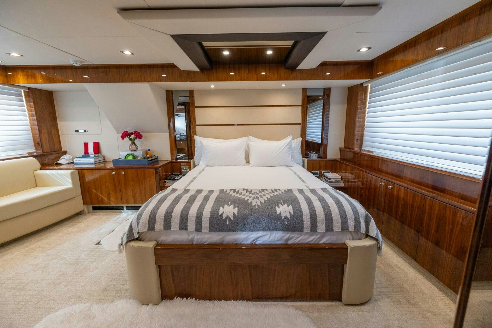 a bed in a room aboard INDECENT PROPOSAL IV Yacht for Sale