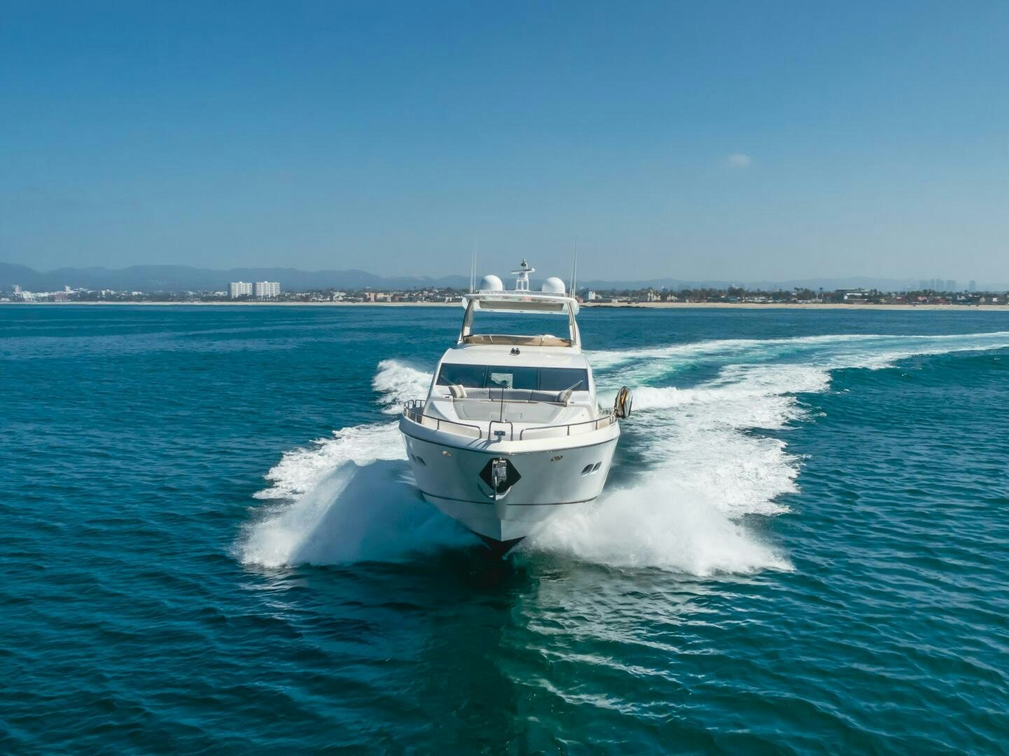 a boat on the water aboard INDECENT PROPOSAL IV Yacht for Sale