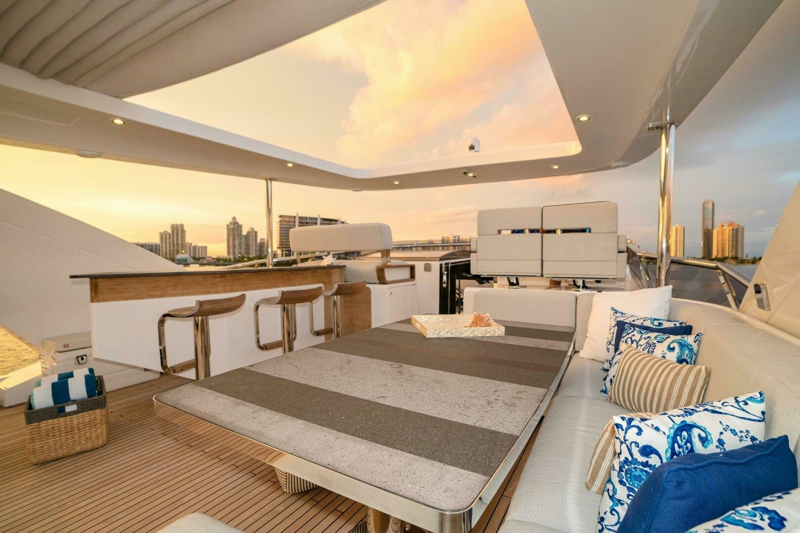 a room with a bed and a table aboard MAJESTIC MOMENTS Yacht for Sale