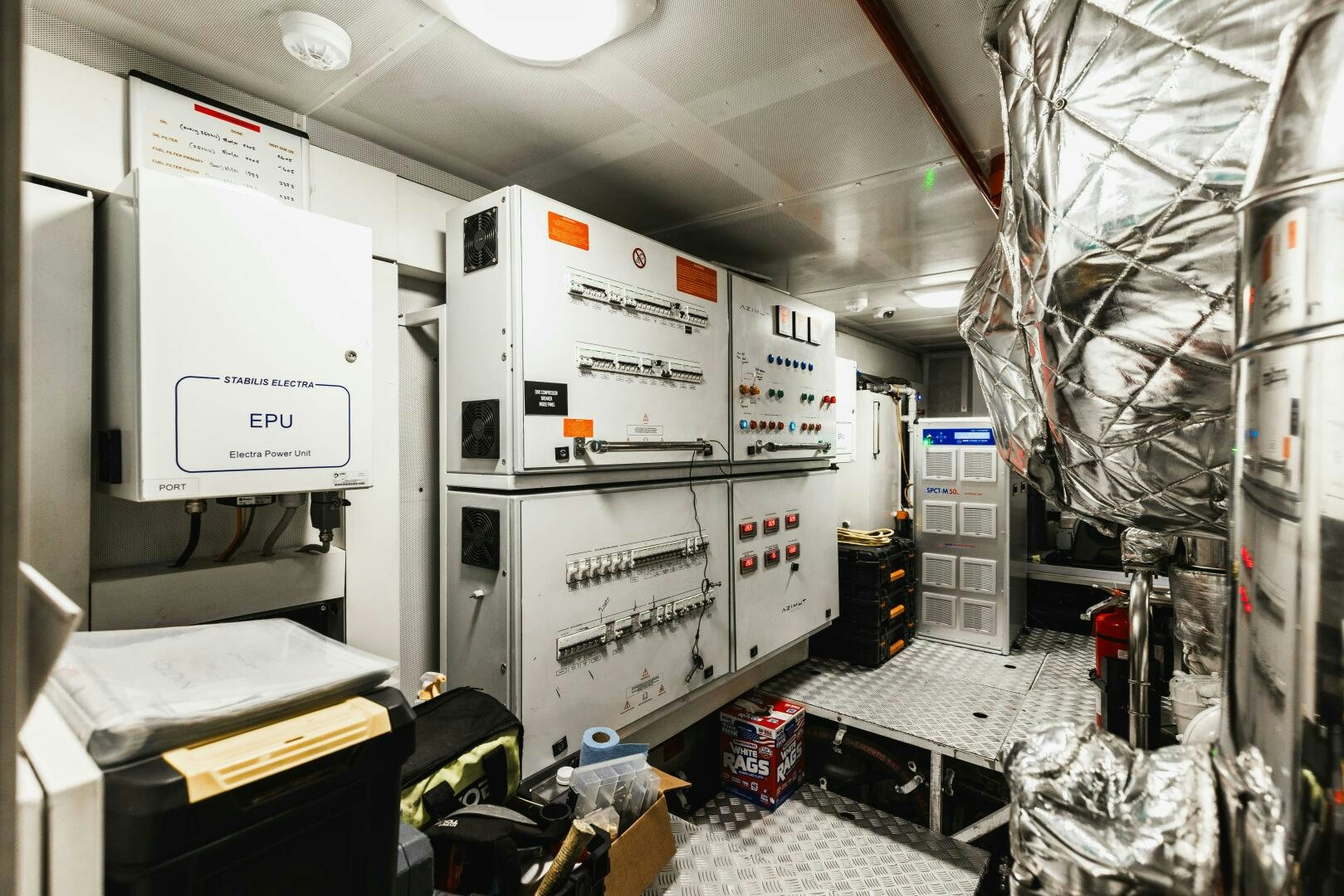 a room with machinery and equipment aboard MAJESTIC MOMENTS Yacht for Sale
