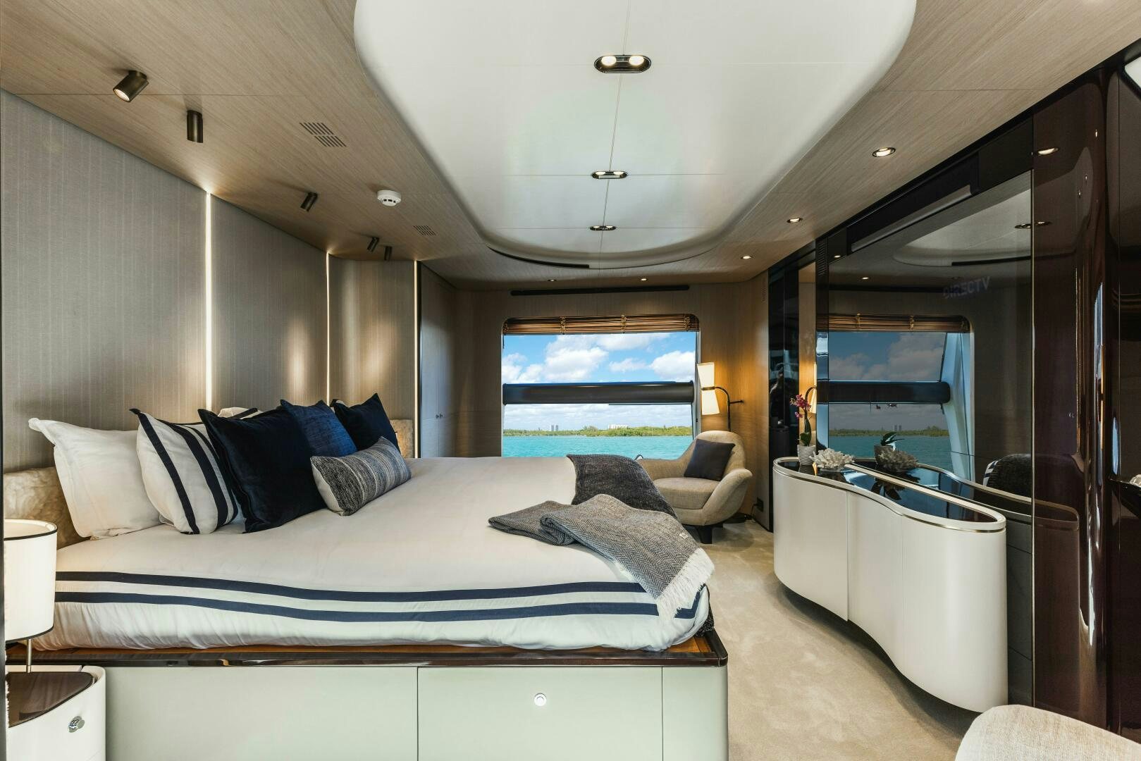 a bedroom with a large bed aboard MAJESTIC MOMENTS Yacht for Sale