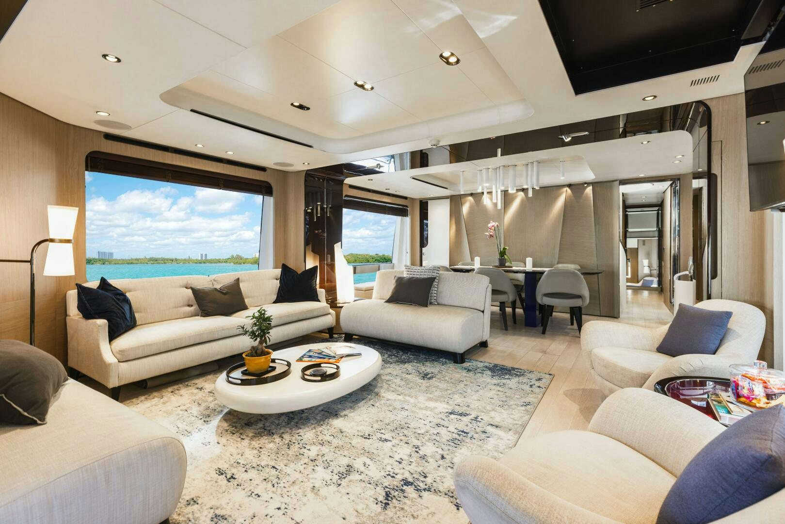 a living room with a large window aboard MAJESTIC MOMENTS Yacht for Sale