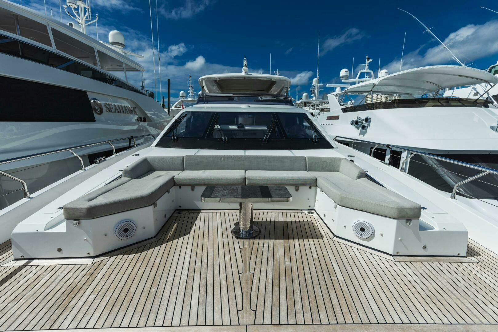 a white car parked on a dock aboard MAJESTIC MOMENTS Yacht for Sale
