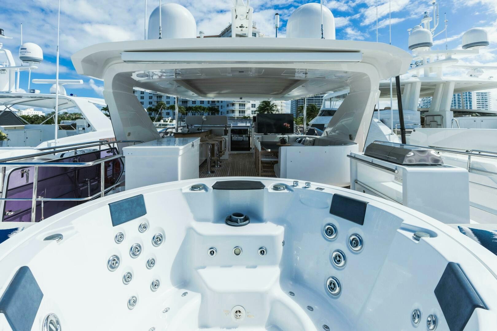 a white machine with a black circle on the front aboard MAJESTIC MOMENTS Yacht for Sale