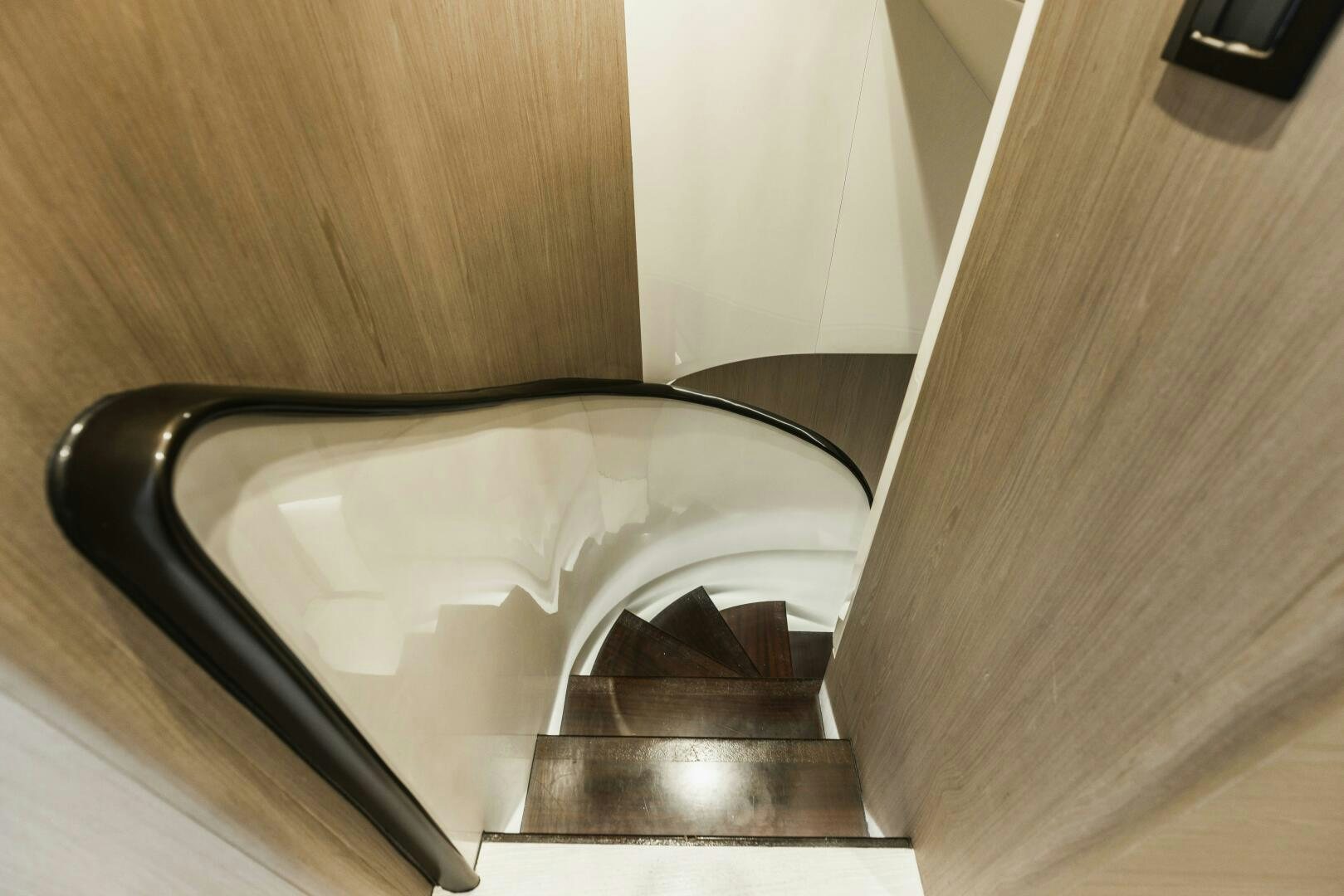 a white lamp on a wooden floor aboard MAJESTIC MOMENTS Yacht for Sale