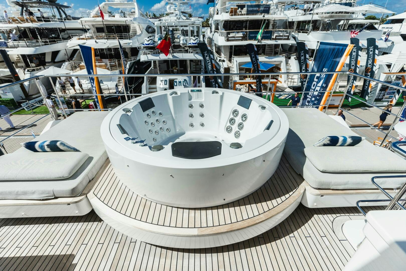 a white boat in a harbor aboard MAJESTIC MOMENTS Yacht for Sale