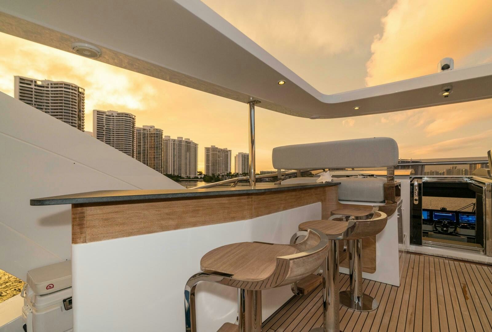 a room with a table and chairs aboard MAJESTIC MOMENTS Yacht for Sale