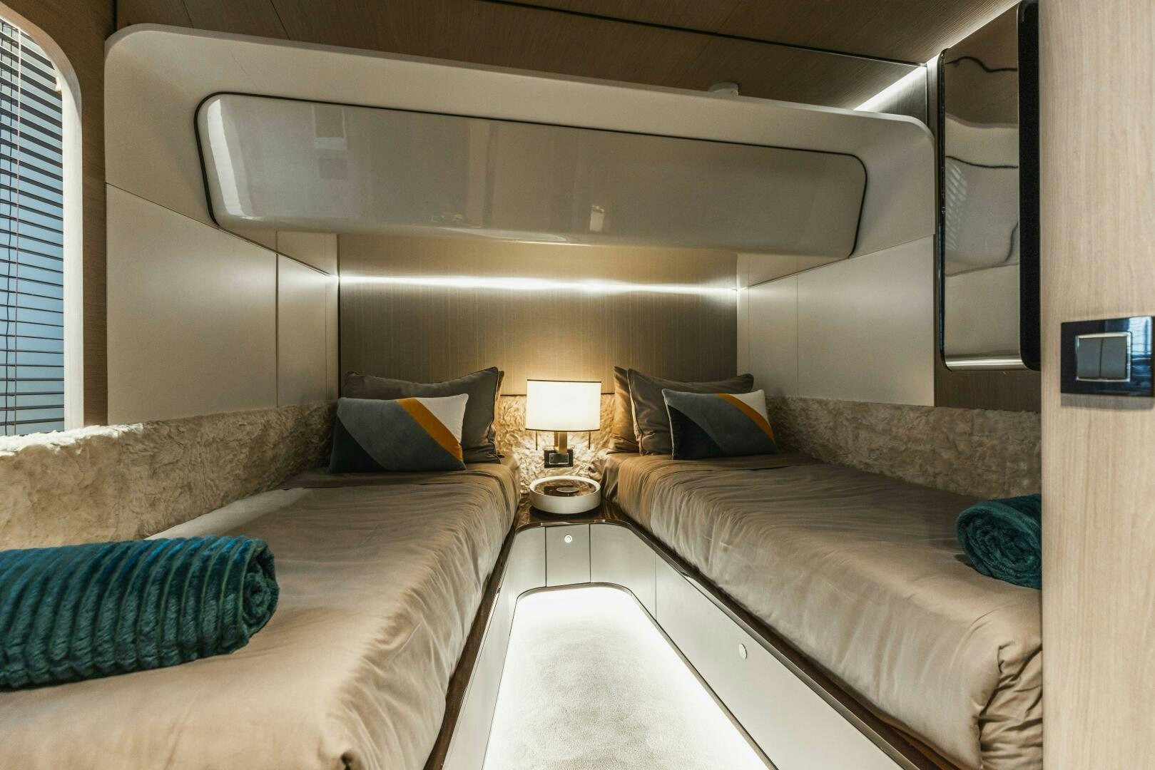 a couple of beds in a room aboard MAJESTIC MOMENTS Yacht for Sale