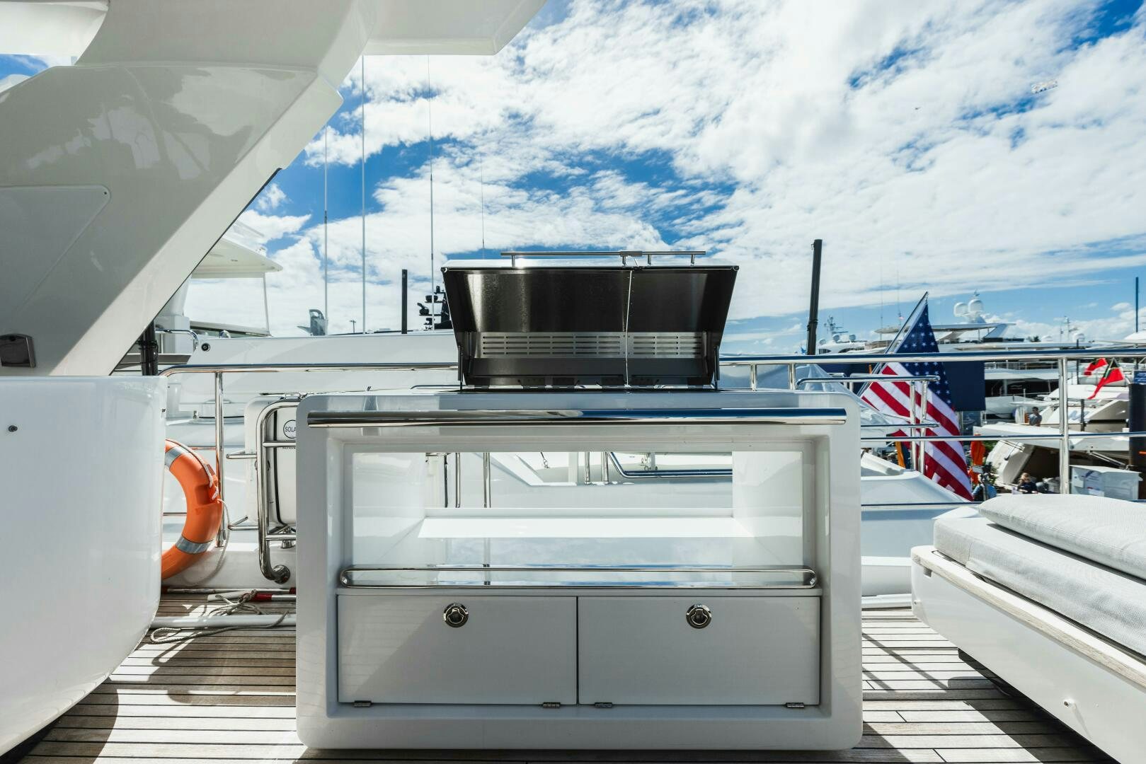 a white printer on a deck aboard MAJESTIC MOMENTS Yacht for Sale