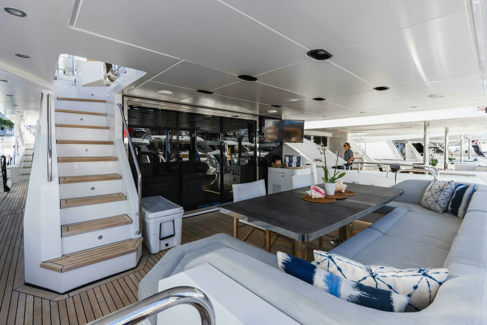 a room with a couch and a table aboard MAJESTIC MOMENTS Yacht for Sale