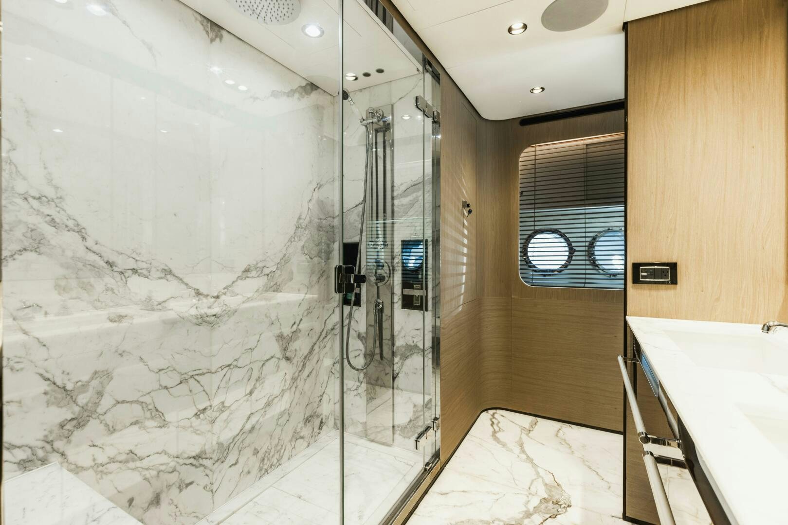 a bathroom with a shower aboard MAJESTIC MOMENTS Yacht for Sale
