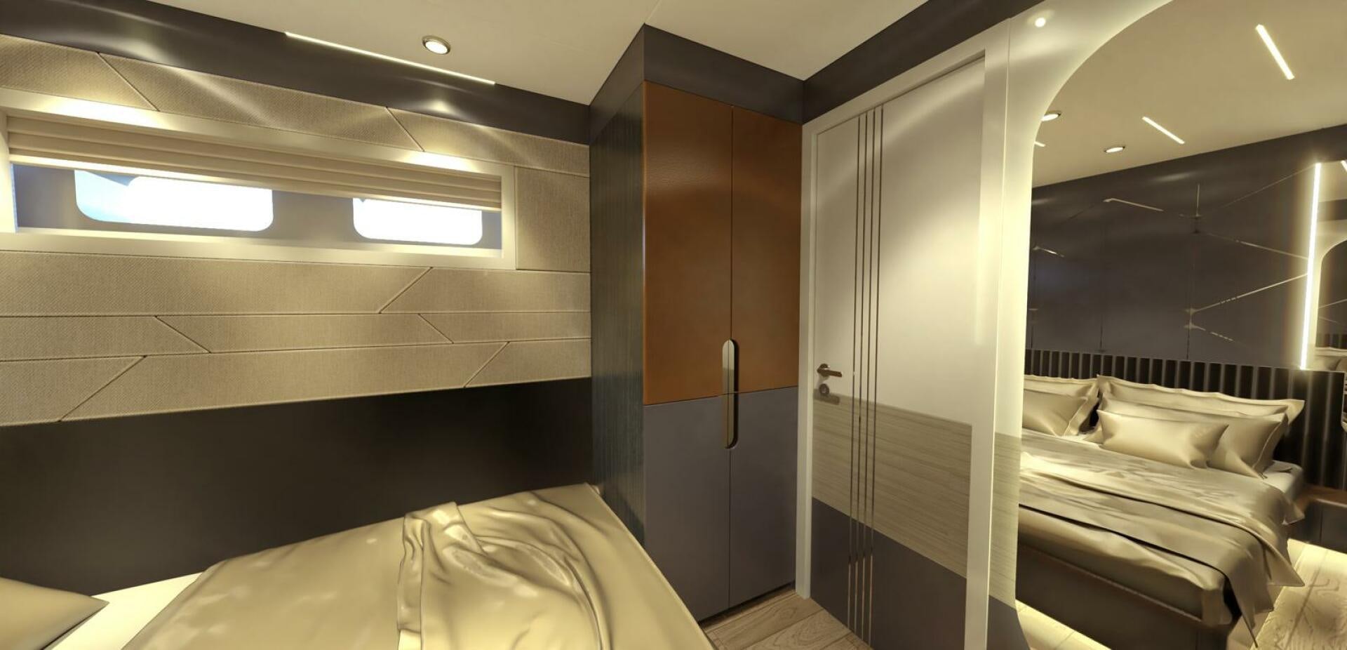 a room with a bed and a door aboard VOYAGE ONE Yacht for Charter