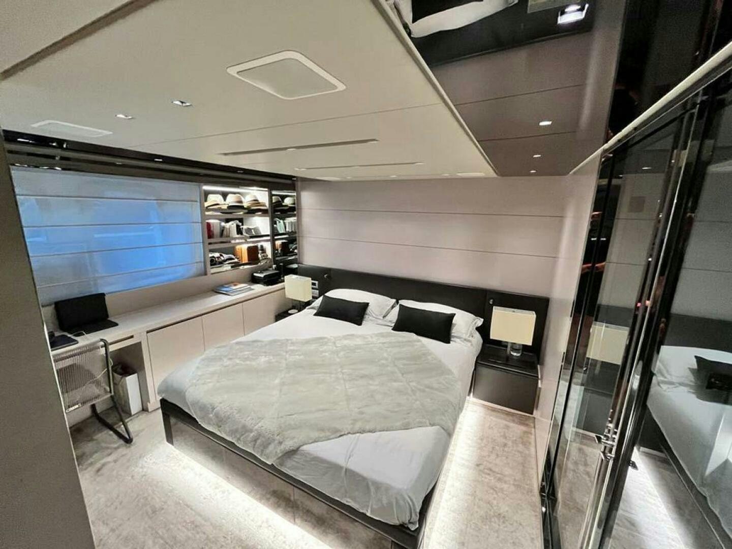 a room with a bed and a tv aboard SIGNE Yacht for Sale