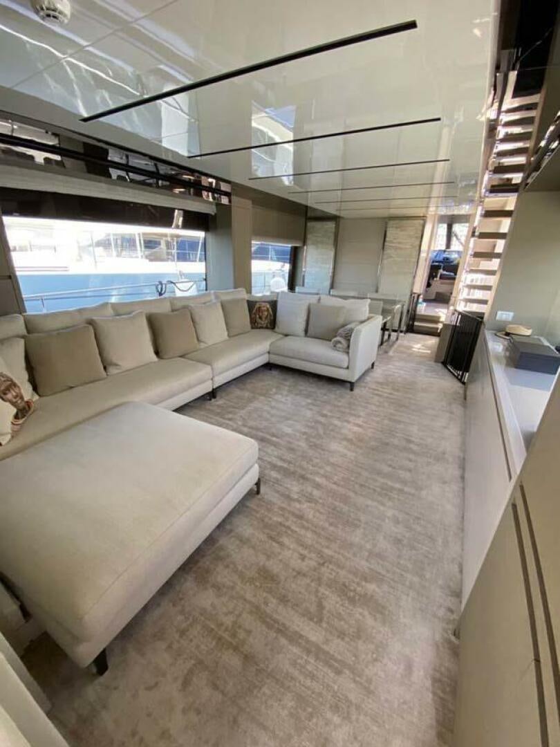 a living room with a large window aboard SIGNE Yacht for Sale