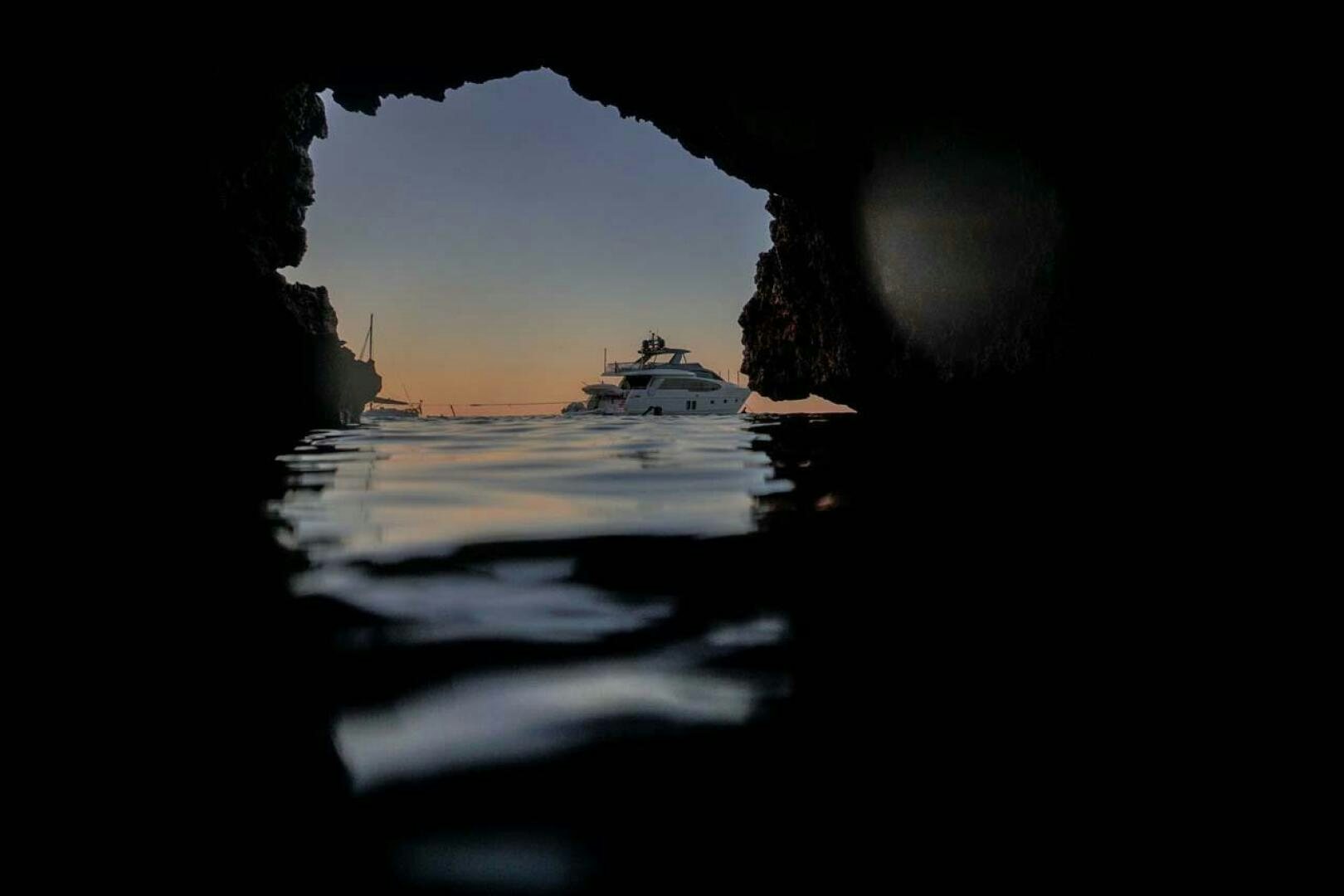 a group of people in a cave aboard SIGNE Yacht for Sale