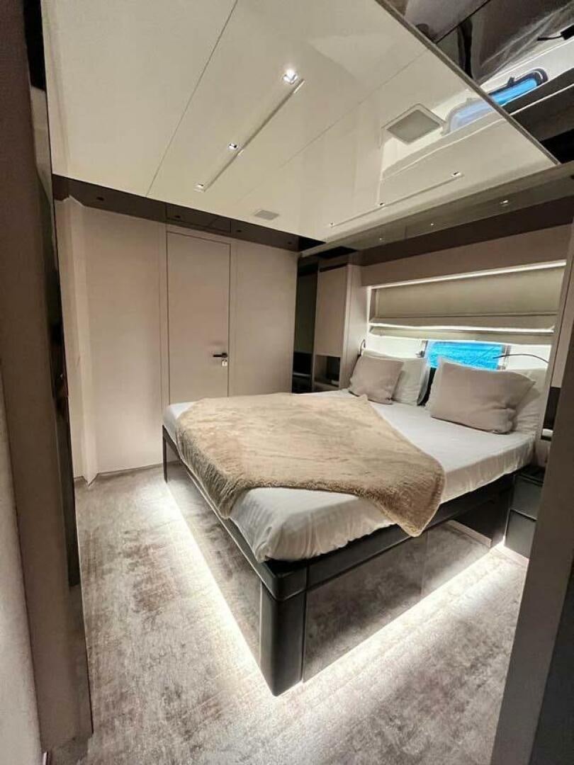 a bed in a room aboard SIGNE Yacht for Sale