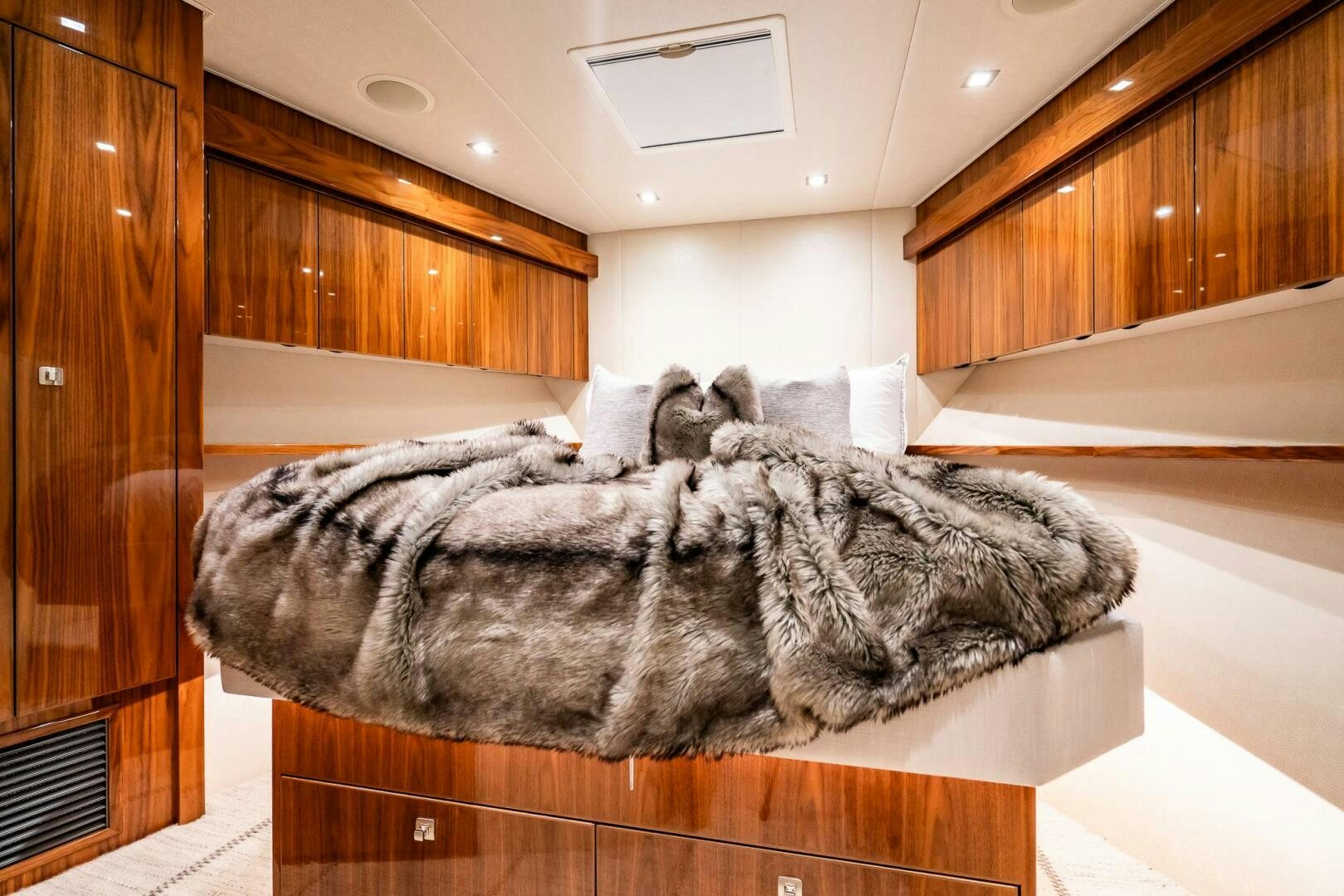 a group of cats lying on a bed in a room aboard FRIGATE Yacht for Sale