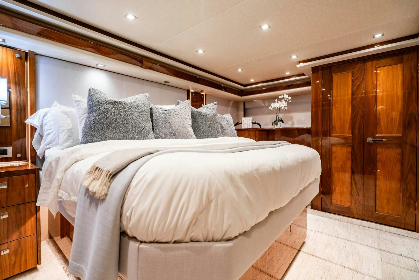 a bed with white sheets aboard FRIGATE Yacht for Sale