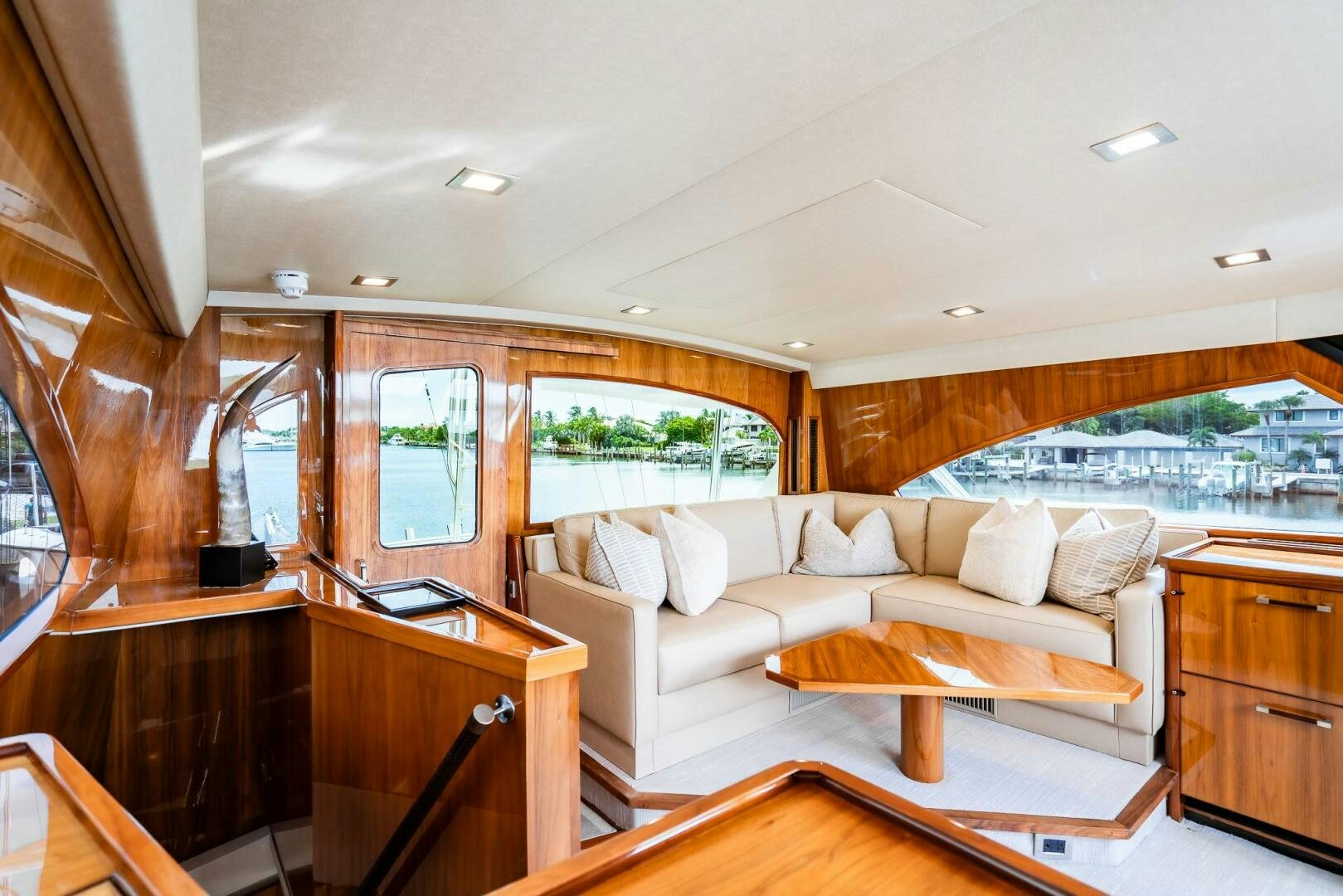 a living room with a couch and a table aboard FRIGATE Yacht for Sale
