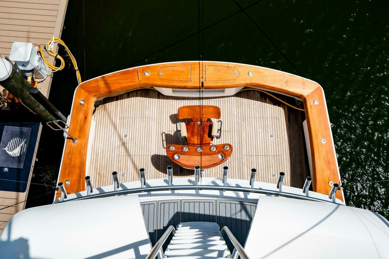 a boat with a large orange object on it aboard FRIGATE Yacht for Sale